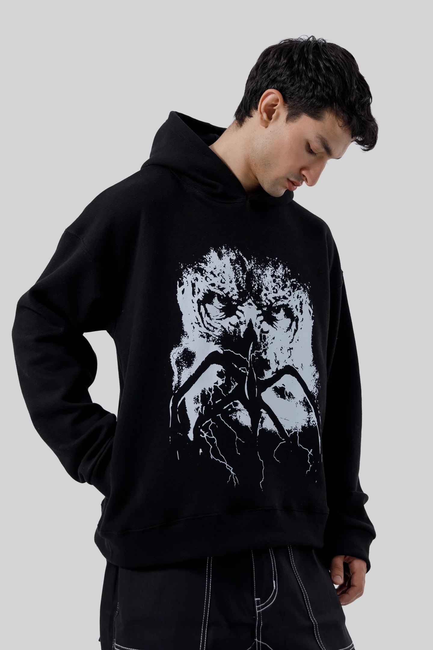 Shop the Stranger Quest Graphic Hoodie at WardrobeX — premium quality, ultra-comfortable, and perfect for winter streetwear in Pakistan. Fast delivery nationwide.