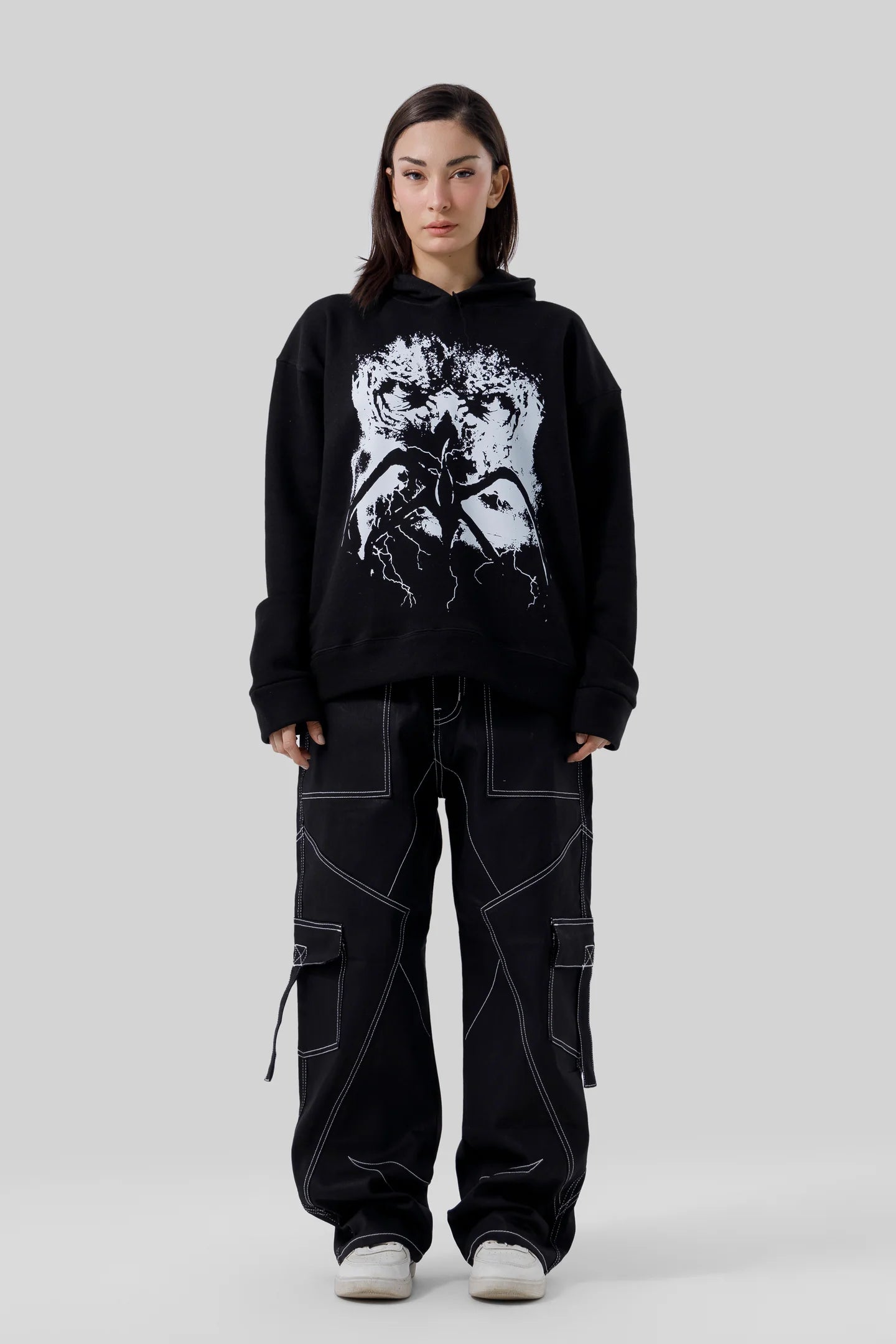 Shop the Stranger Quest Graphic Hoodie at WardrobeX — premium quality, ultra-comfortable, and perfect for winter streetwear in Pakistan. Fast delivery nationwide.