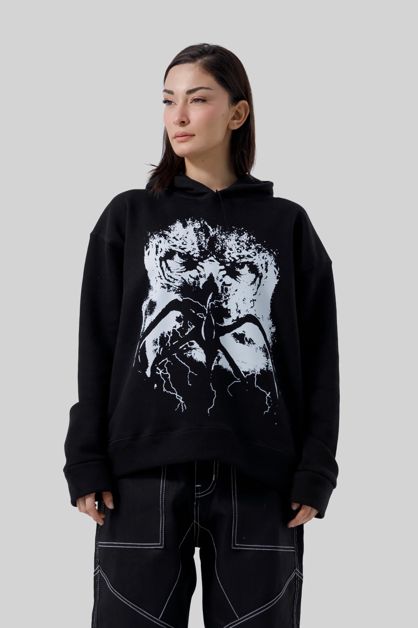 Shop the Stranger Quest Graphic Hoodie at WardrobeX — premium quality, ultra-comfortable, and perfect for winter streetwear in Pakistan. Fast delivery nationwide.