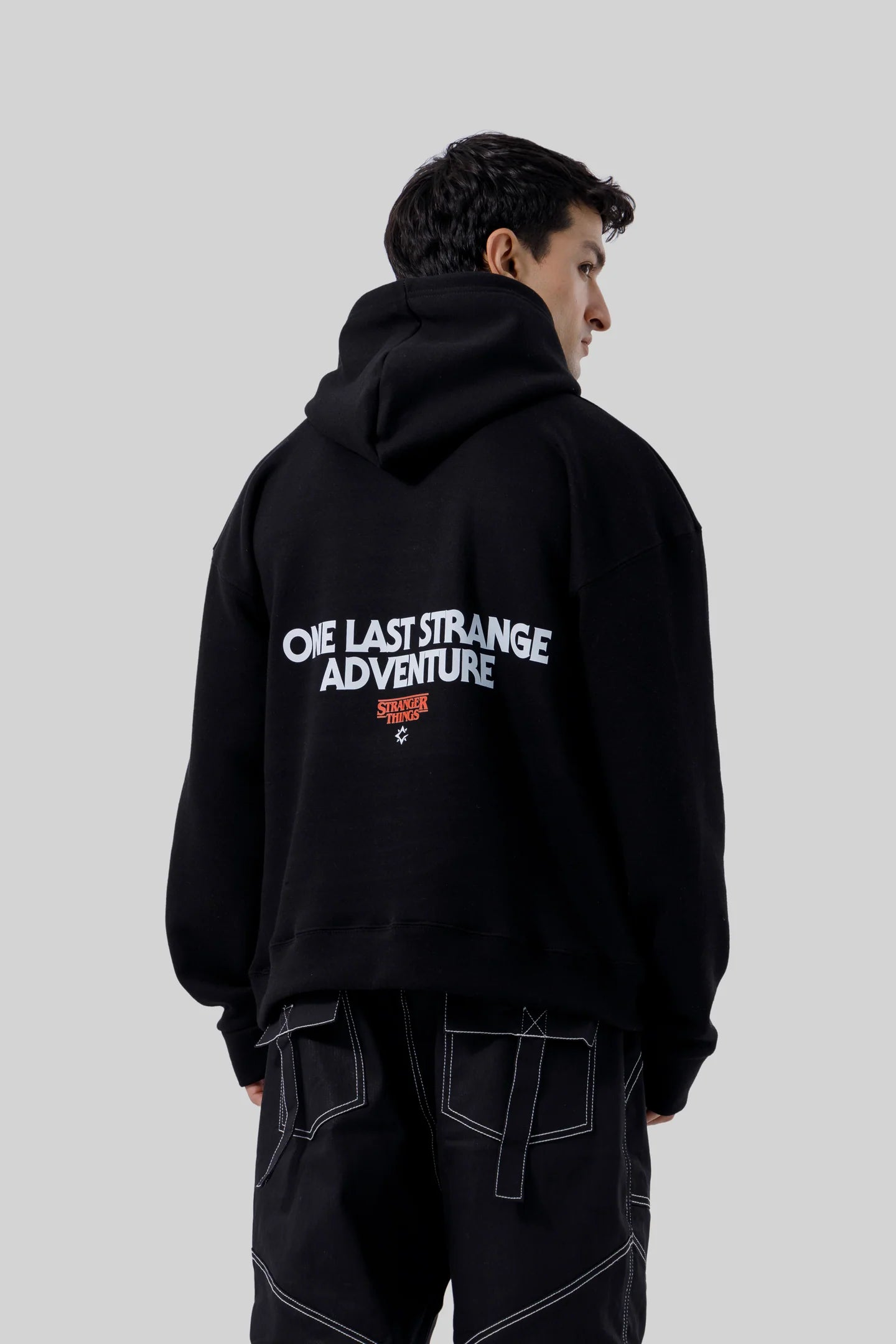 Shop the Stranger Quest Graphic Hoodie at WardrobeX — premium quality, ultra-comfortable, and perfect for winter streetwear in Pakistan. Fast delivery nationwide.