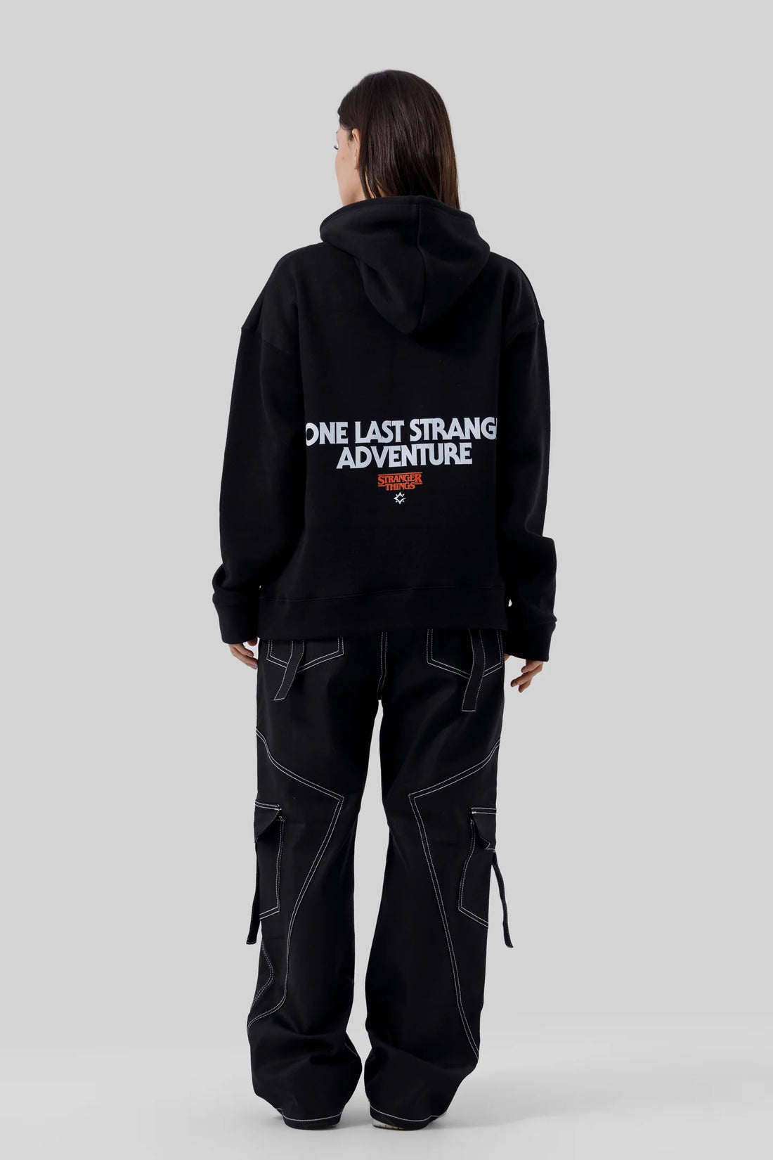 Shop the Stranger Quest Graphic Hoodie at WardrobeX — premium quality, ultra-comfortable, and perfect for winter streetwear in Pakistan. Fast delivery nationwide.