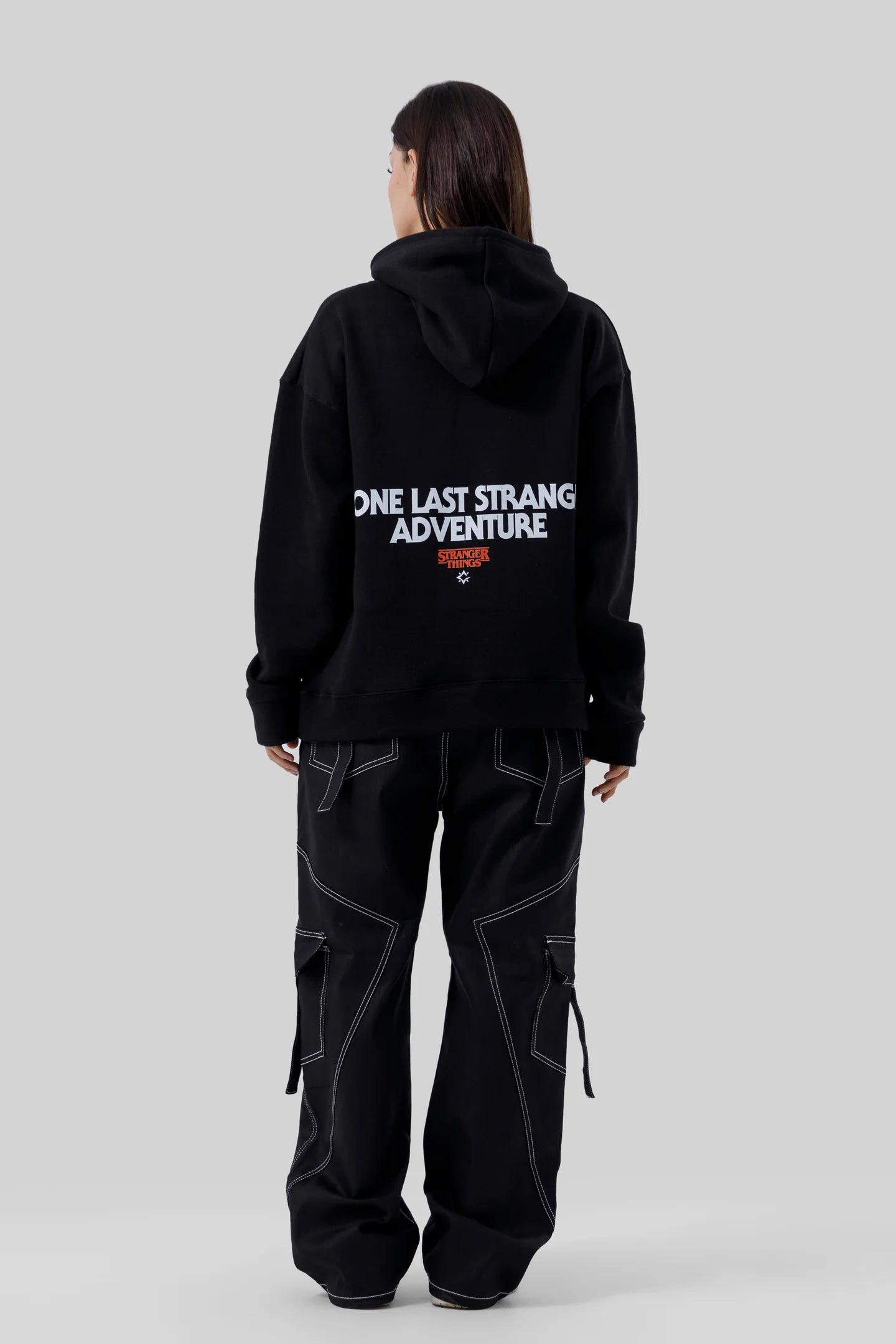 Shop the Stranger Quest Graphic Hoodie at WardrobeX — premium quality, ultra-comfortable, and perfect for winter streetwear in Pakistan. Fast delivery nationwide.