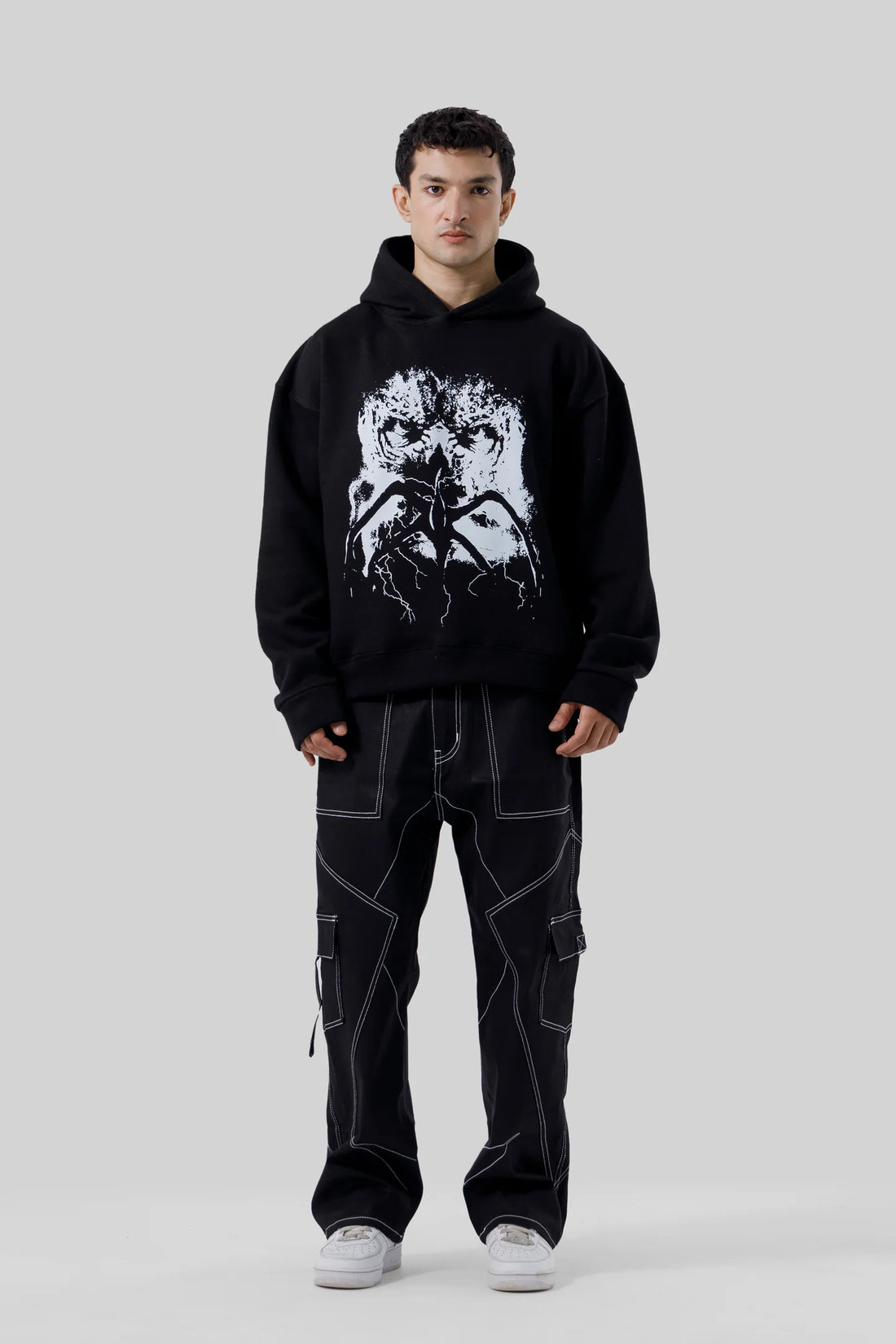 Shop the Stranger Quest Graphic Hoodie at WardrobeX — premium quality, ultra-comfortable, and perfect for winter streetwear in Pakistan. Fast delivery nationwide.