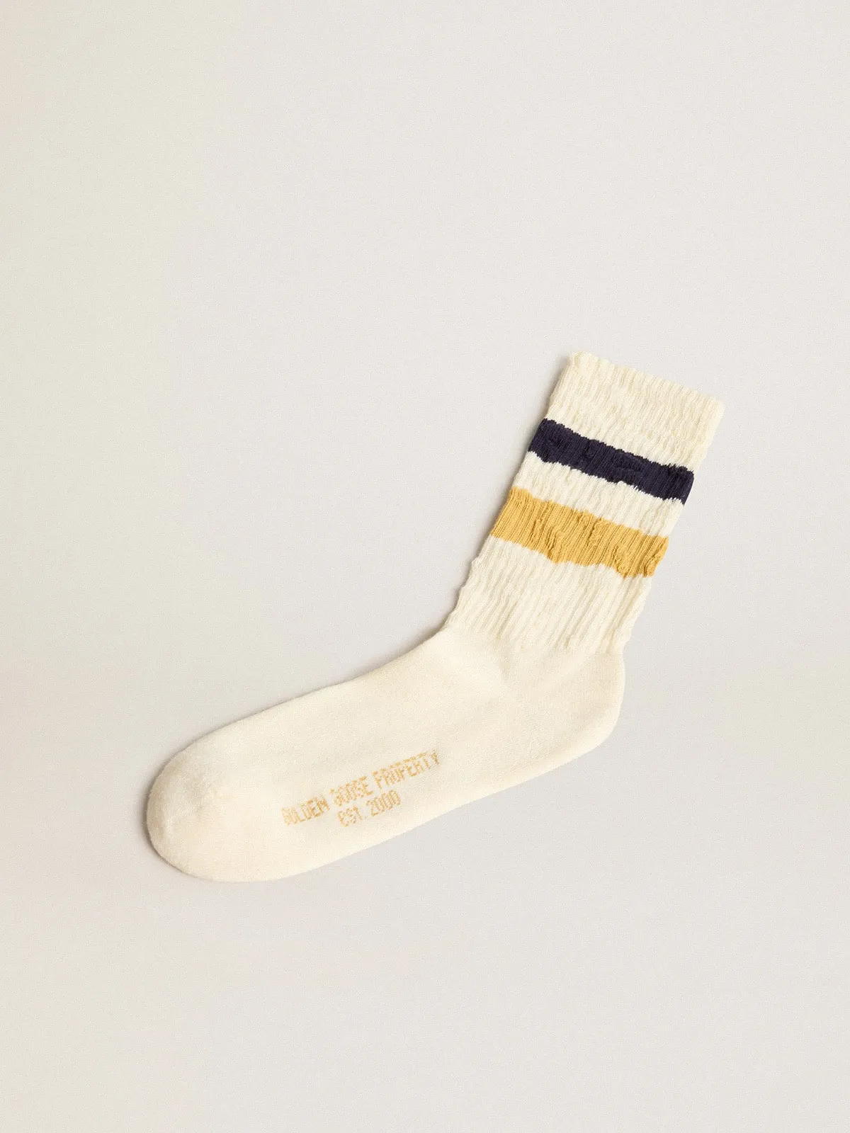 Aged-white socks with distressed details and two-tone stripes