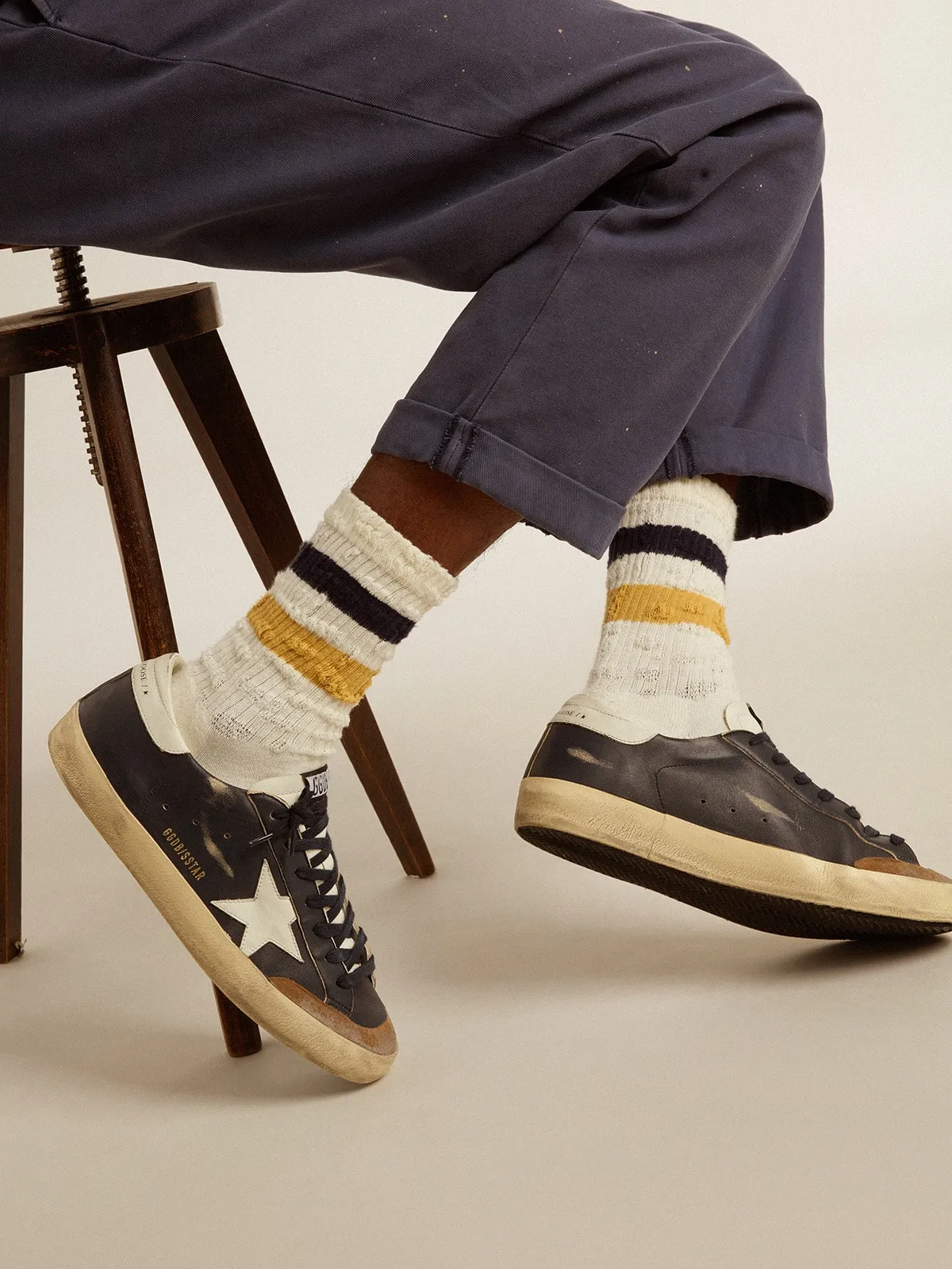 Aged-white socks with distressed details and two-tone stripes