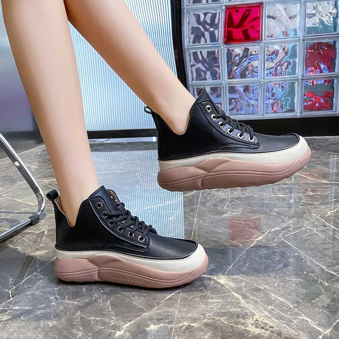 Black stitch accents rocker bottom shoe sneaker