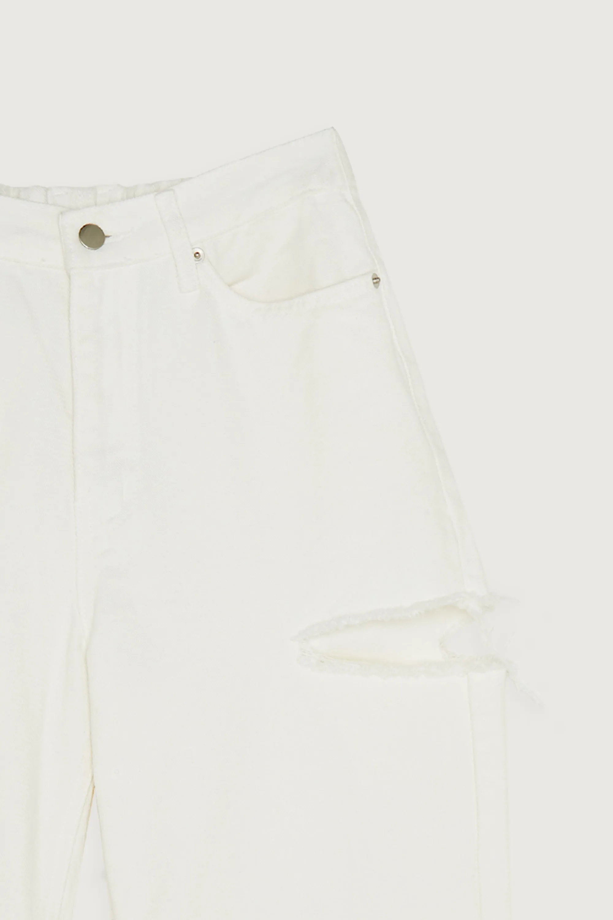 DISTRESSED WHITE JEANS