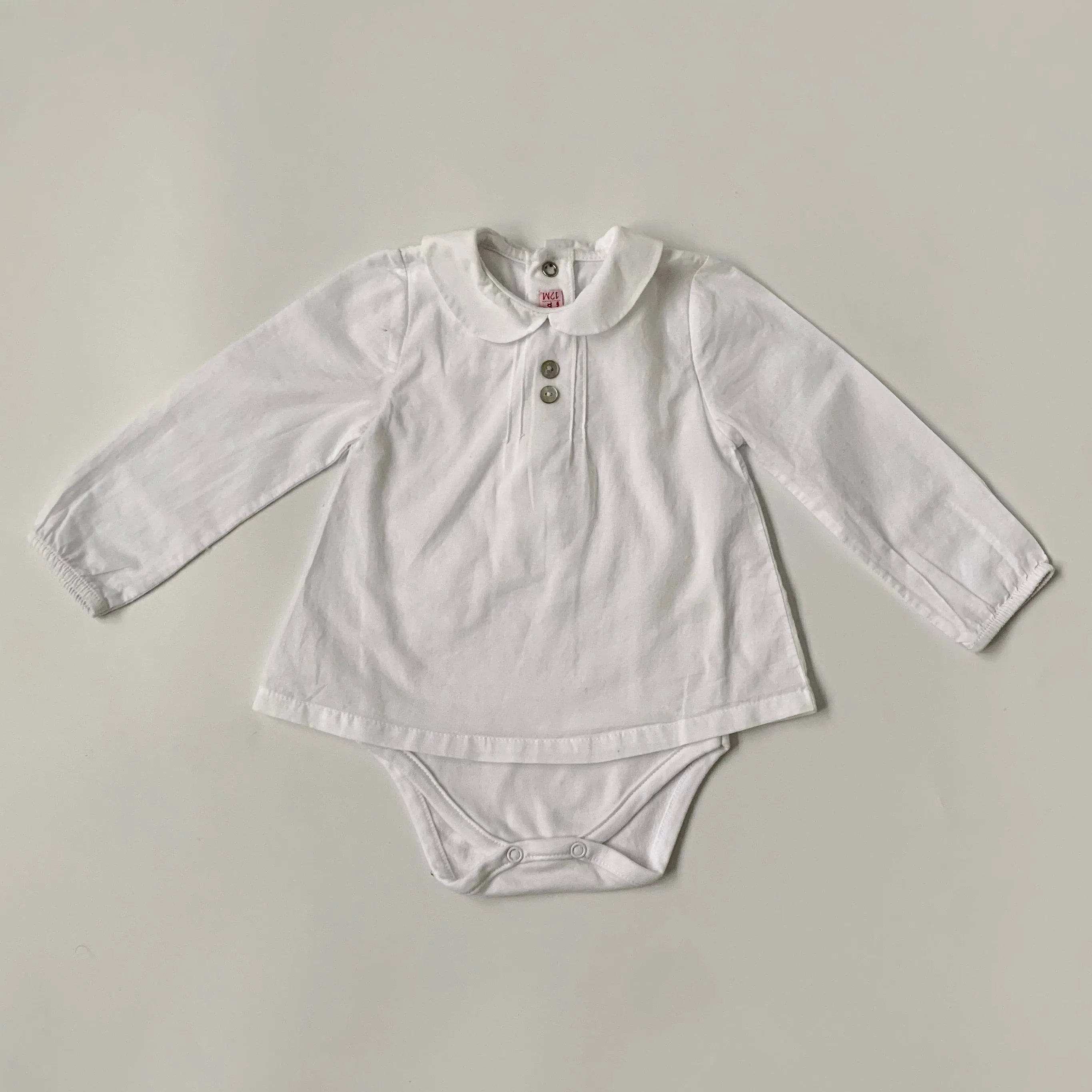 La Coqueta White Cotton Bodysuit: 12 Months