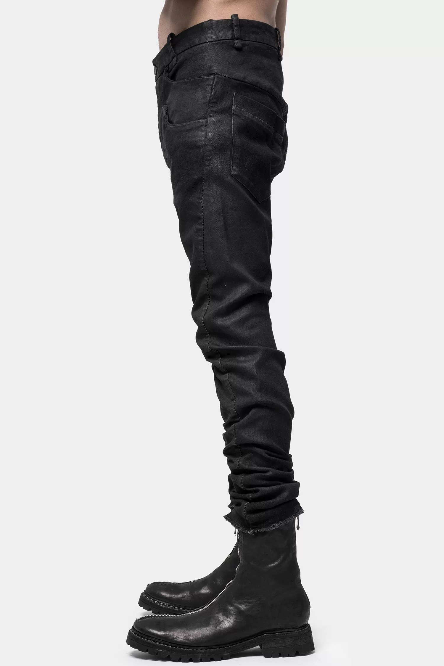 Layered pocket resinated jeans