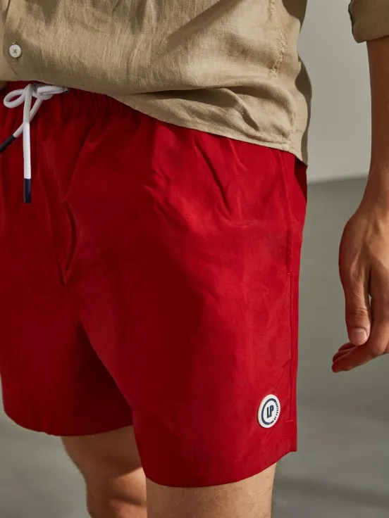 Man's regular fit swim shorts with elastic waistband and drawstring