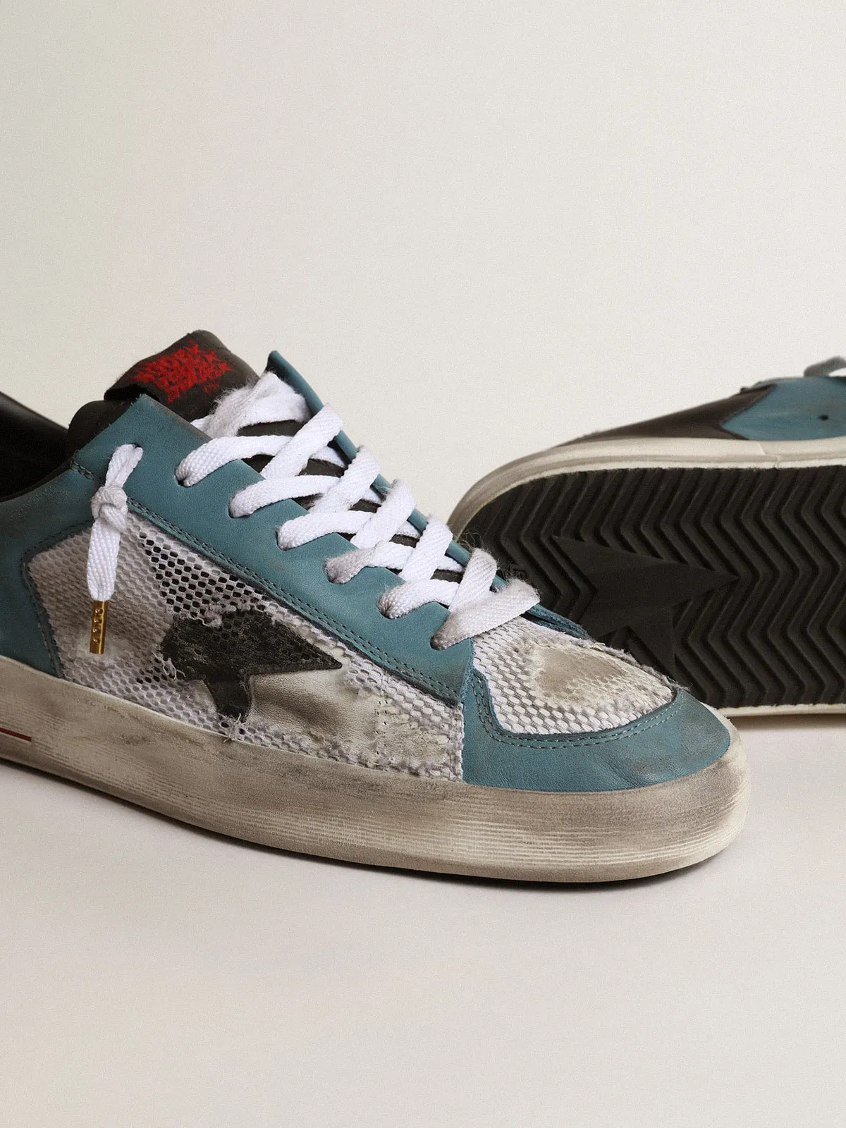 Men's Stardan in distressed mesh and petrol-colored upper